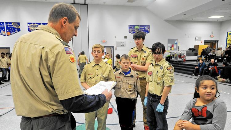 Scouts learning outdoor skills